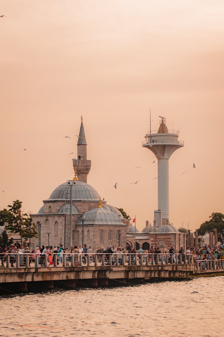 People Walking On The Bridge Near Shemsi Pasha Mosque