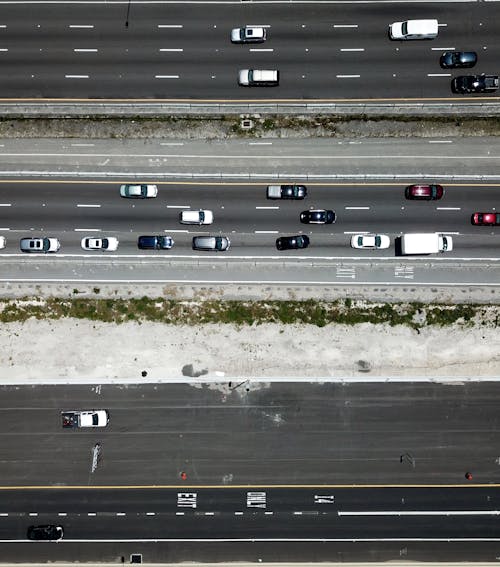 An Aerial Photography of Moving Cars on the Road