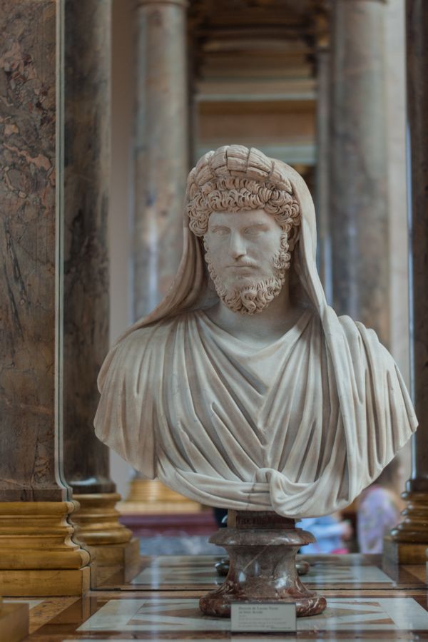 Marble bust in a gallery, Oussama Bergaoui on Pexels