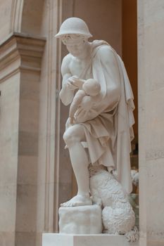 Marble Statue Beside a Column