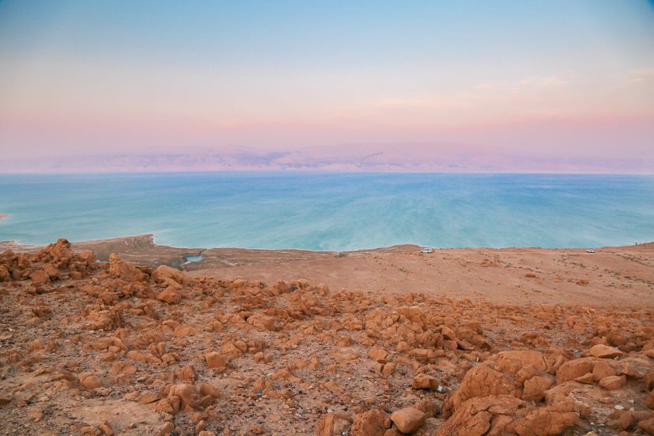 People floating in the Dead Sea, Jordan, on a sunny summer day