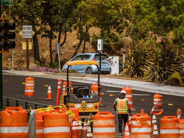 Worker On Asphalt During Roadworks