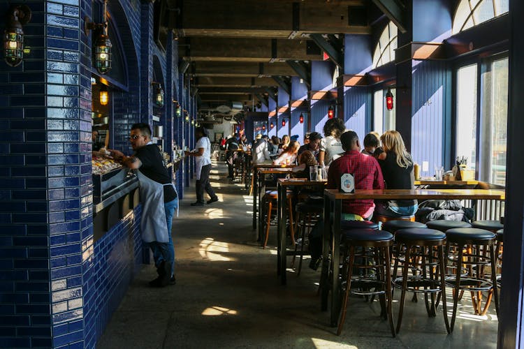 People Inside A Busy Rstaurant