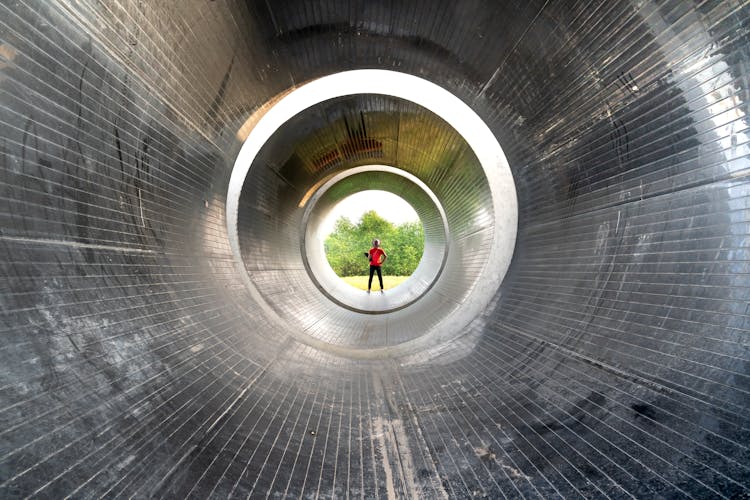 Person Standing In Tube