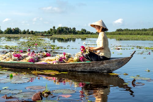 Foto profissional grátis de barco, comerciante, flores