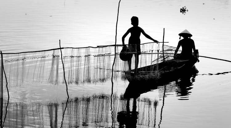 Two People In A Boat