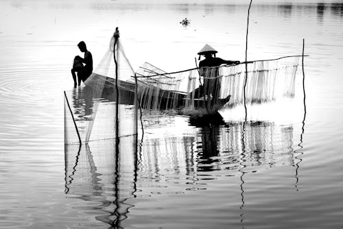 Fishermen on River in Black and White