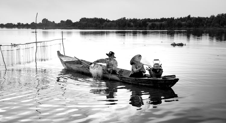 People Cooking On Boat