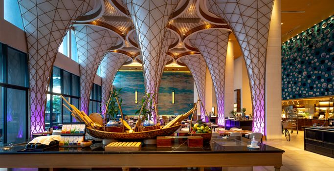 Stunning restaurant interior with futuristic decor and unique architectural elements.