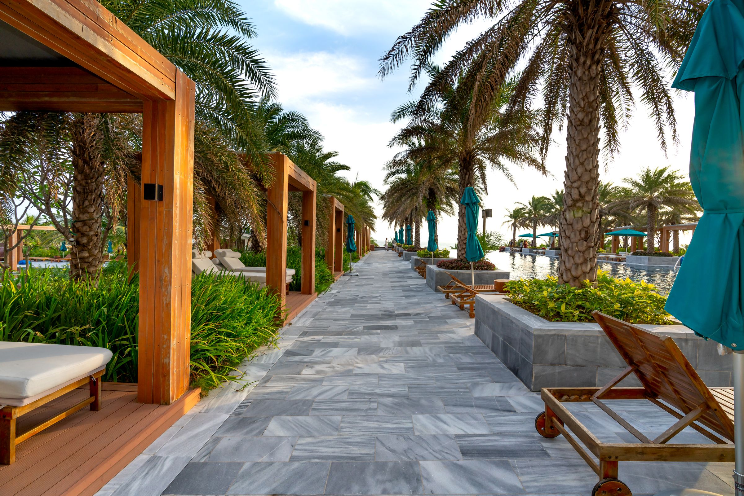 Sunny coastal promenade where remote workers gather