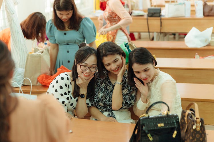 A Group Of Women Posing Together