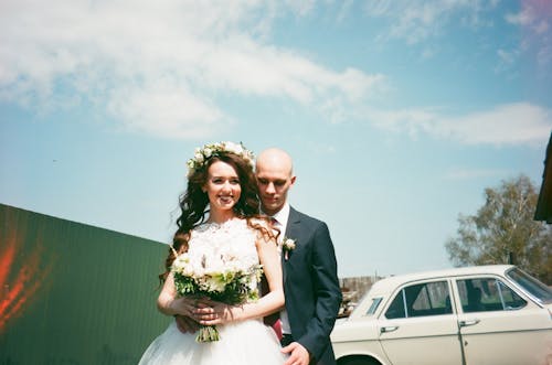 Free Groom Hugging His Wife Stock Photo