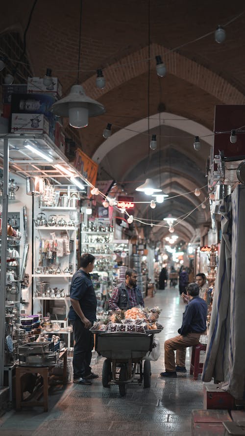 People in an Indoor Market 