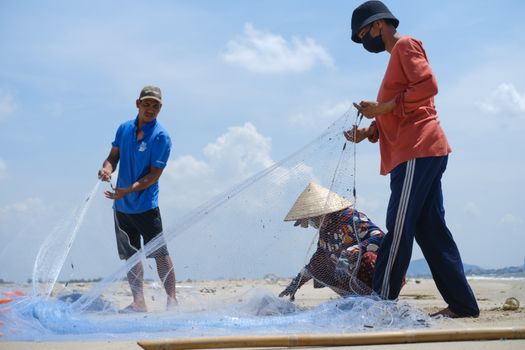 Fishermen holding Fishing Nets 