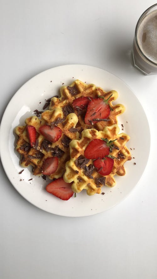 Free Close-up Photo of Waffles and Strawberries Stock Photo