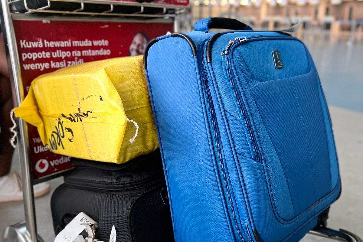 Cabin bags and suitcases packed for a journey
