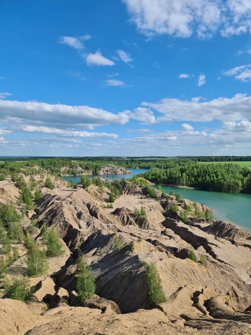 Free Breathtaking view of rocky formations and a river under a clear blue sky, perfect for nature lovers. Stock Photo