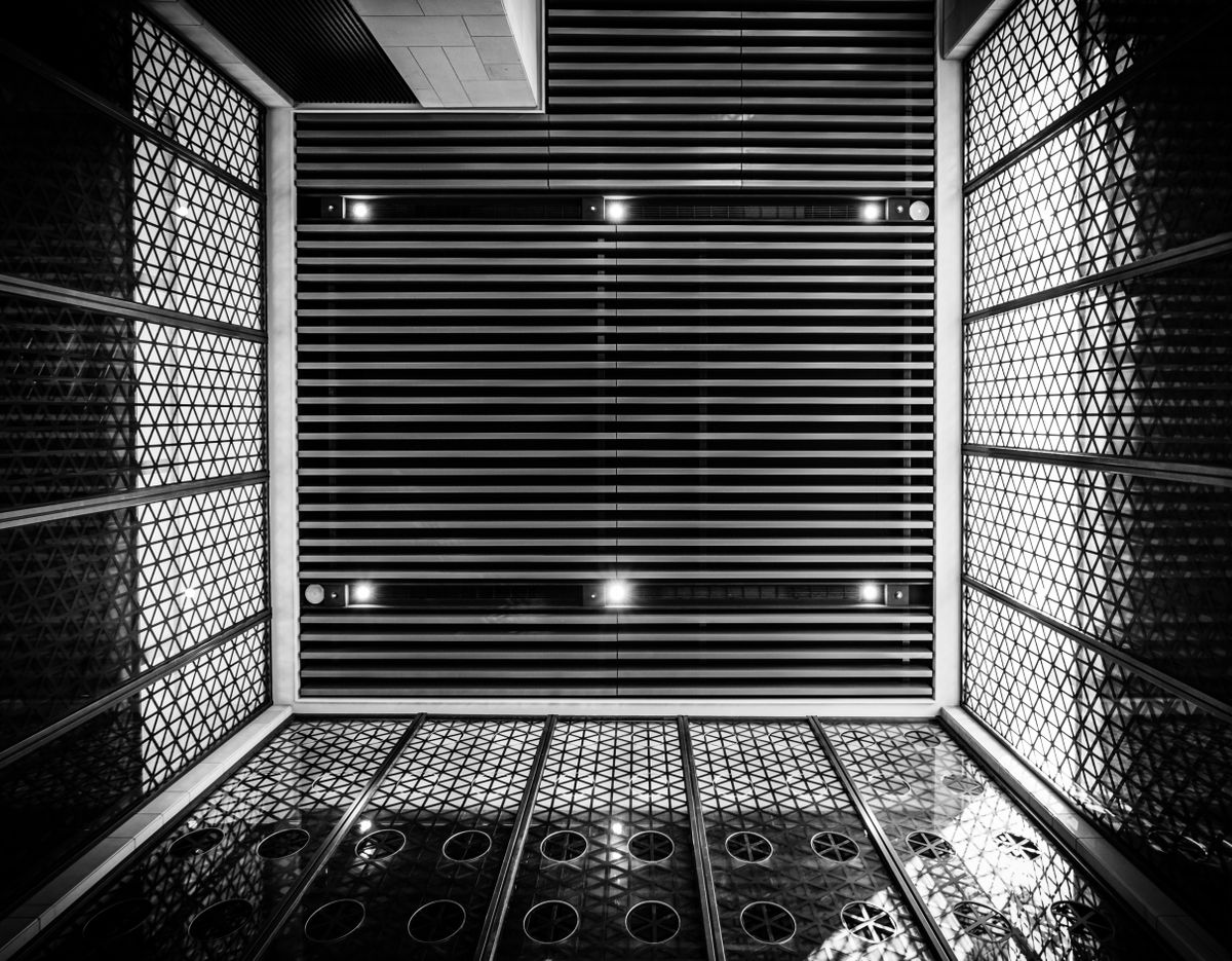 Black and white geometric architectural detail informing the Aureon Vision art direction
