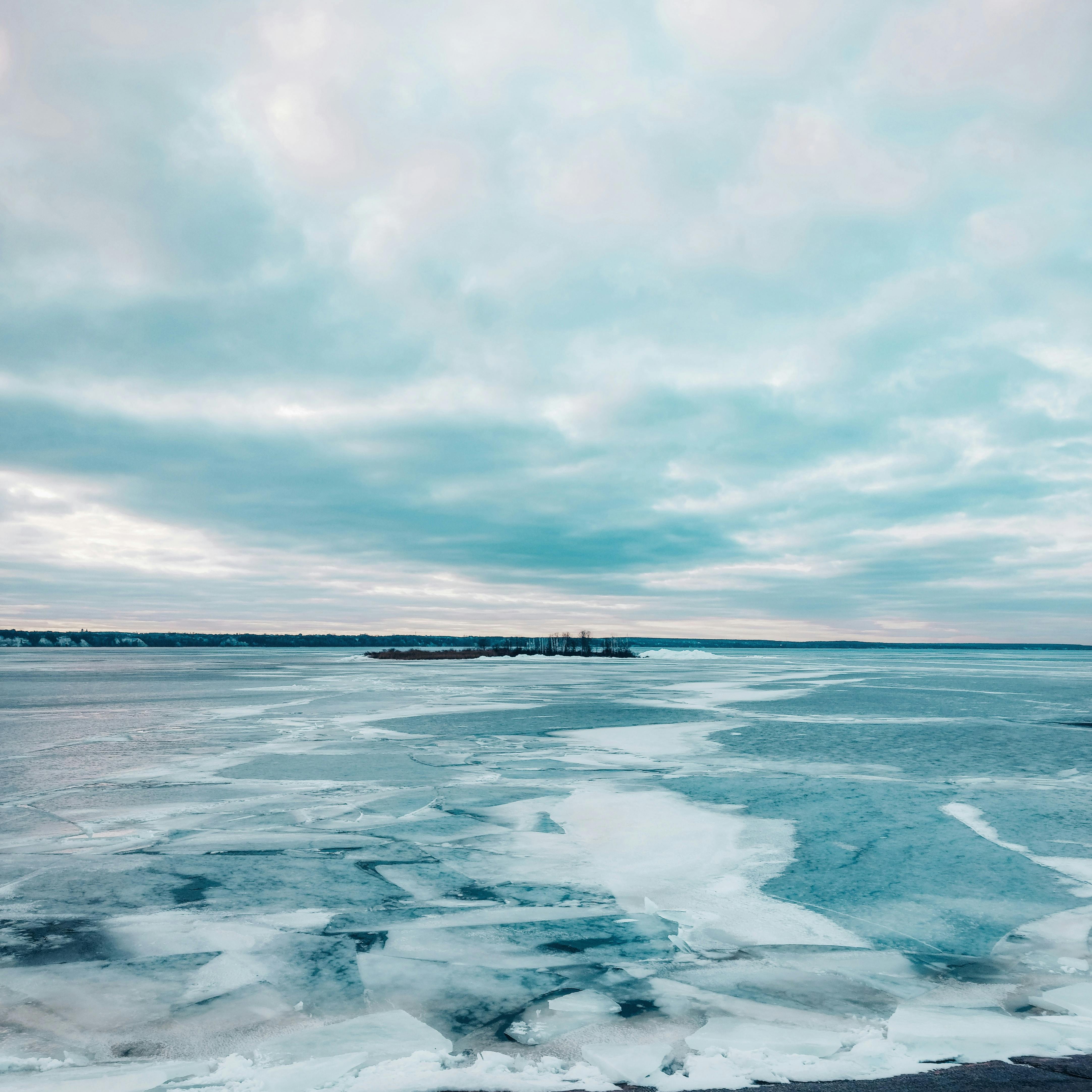 Frozen Lake Under Cloudy Sky · Free Stock Photo