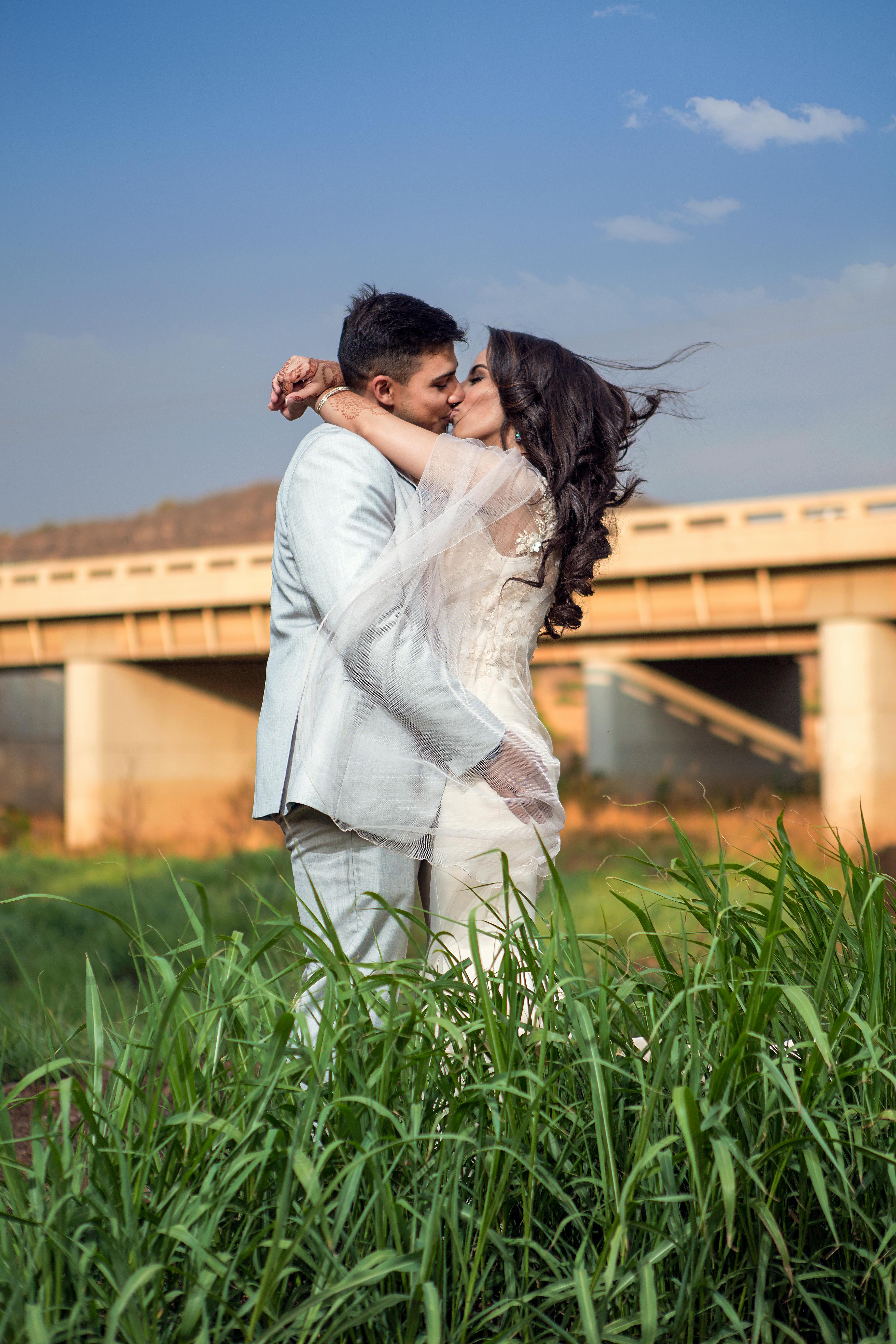 man and woman kissing