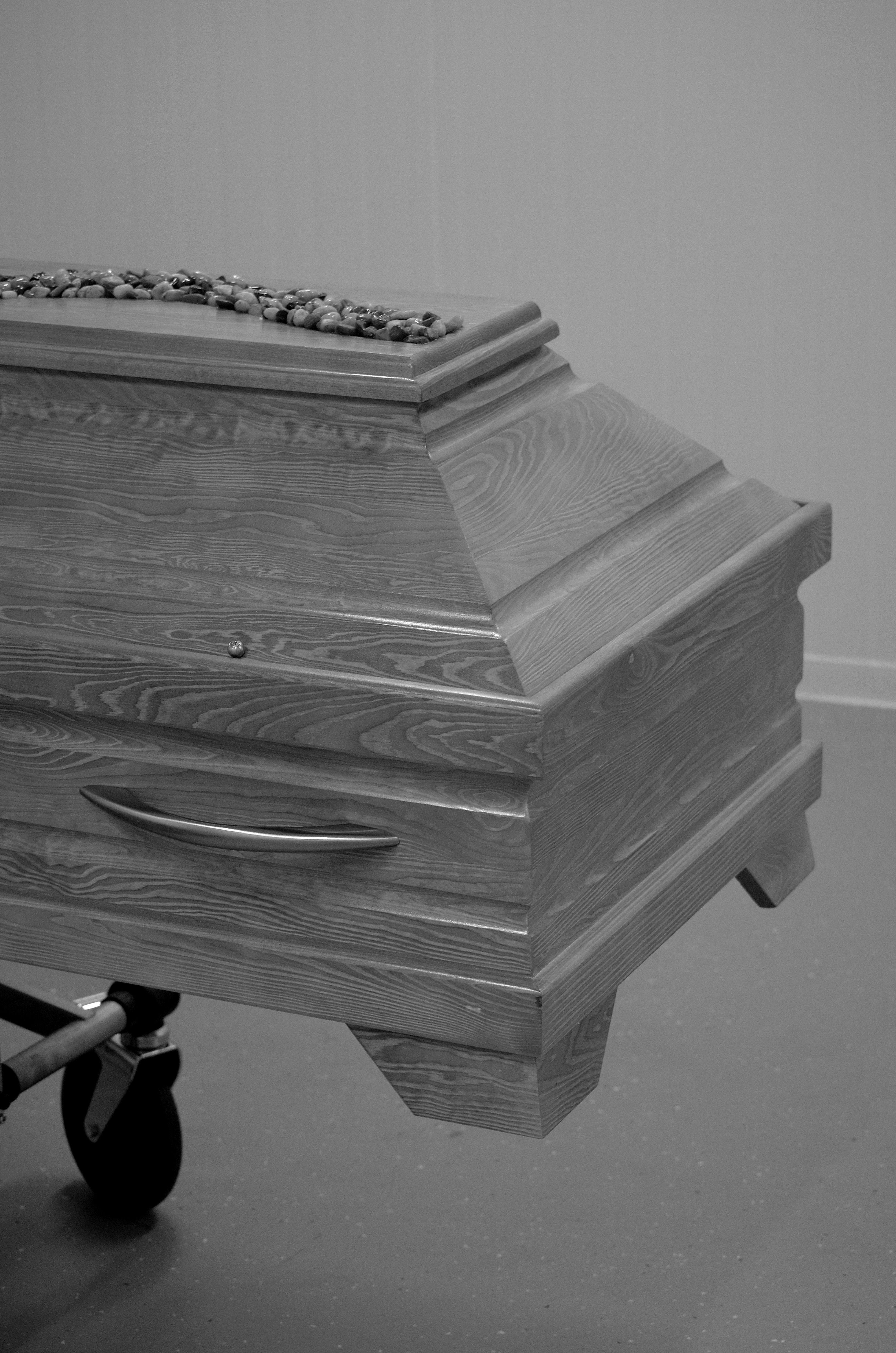 Monochrome Photo of Flowers on Top of Coffin · Free Stock Photo