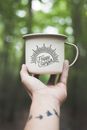 Person Holding White Ceramic Mug