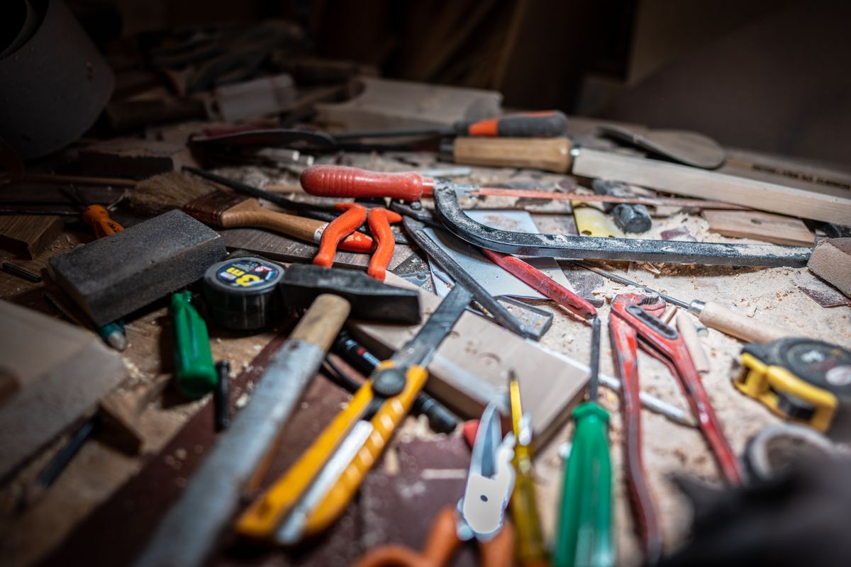 Handyman workbench with well-used tools ready for the next repair job