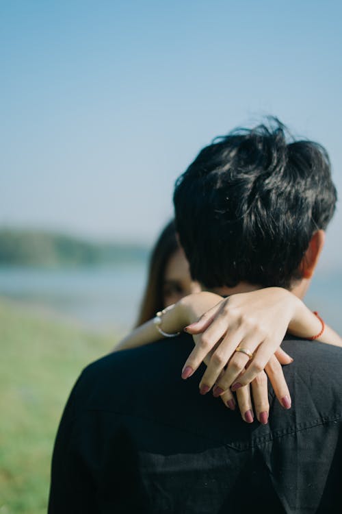 Woman Hugging a Man