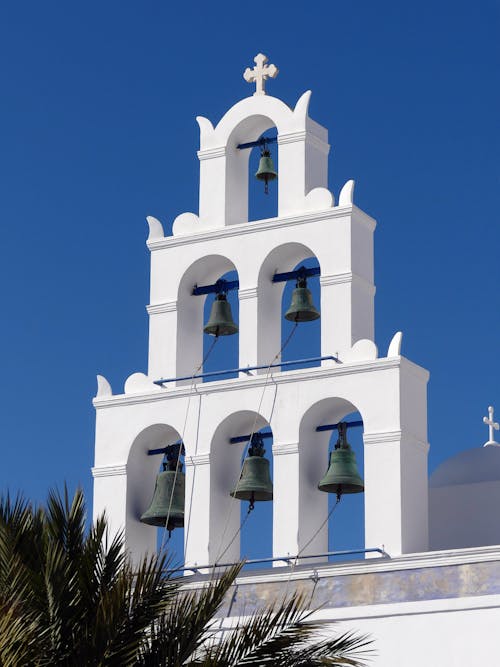 Foto profissional grátis de arquitetura, calça de cintura baixa, campanário