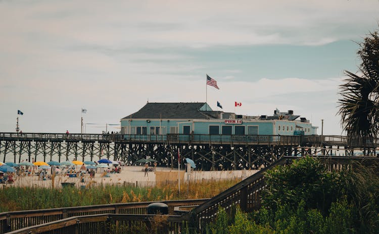 Tourists On The Beach At Pier 14 Seafood Restaurant In Myrtle Beach