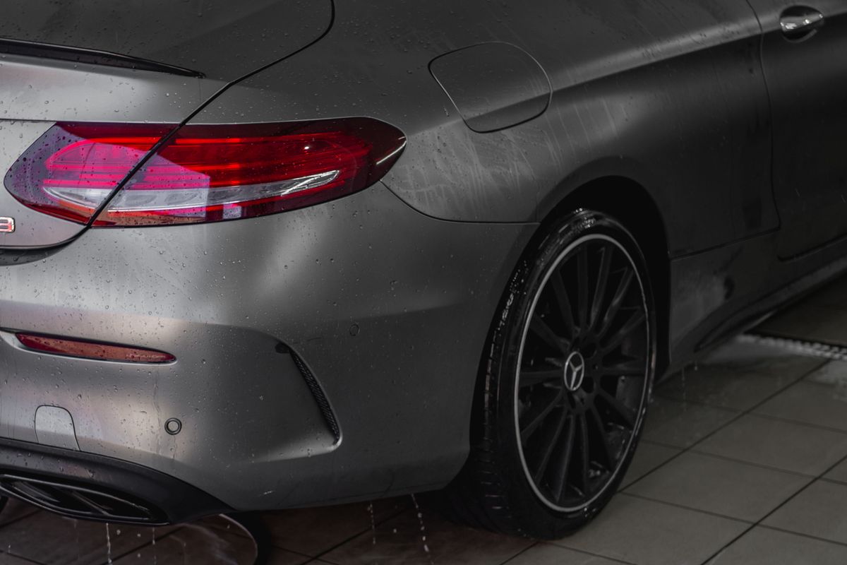 A detailed car photographed under low evening light