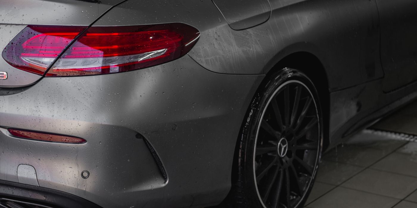 A freshly detailed electric vehicle under low light