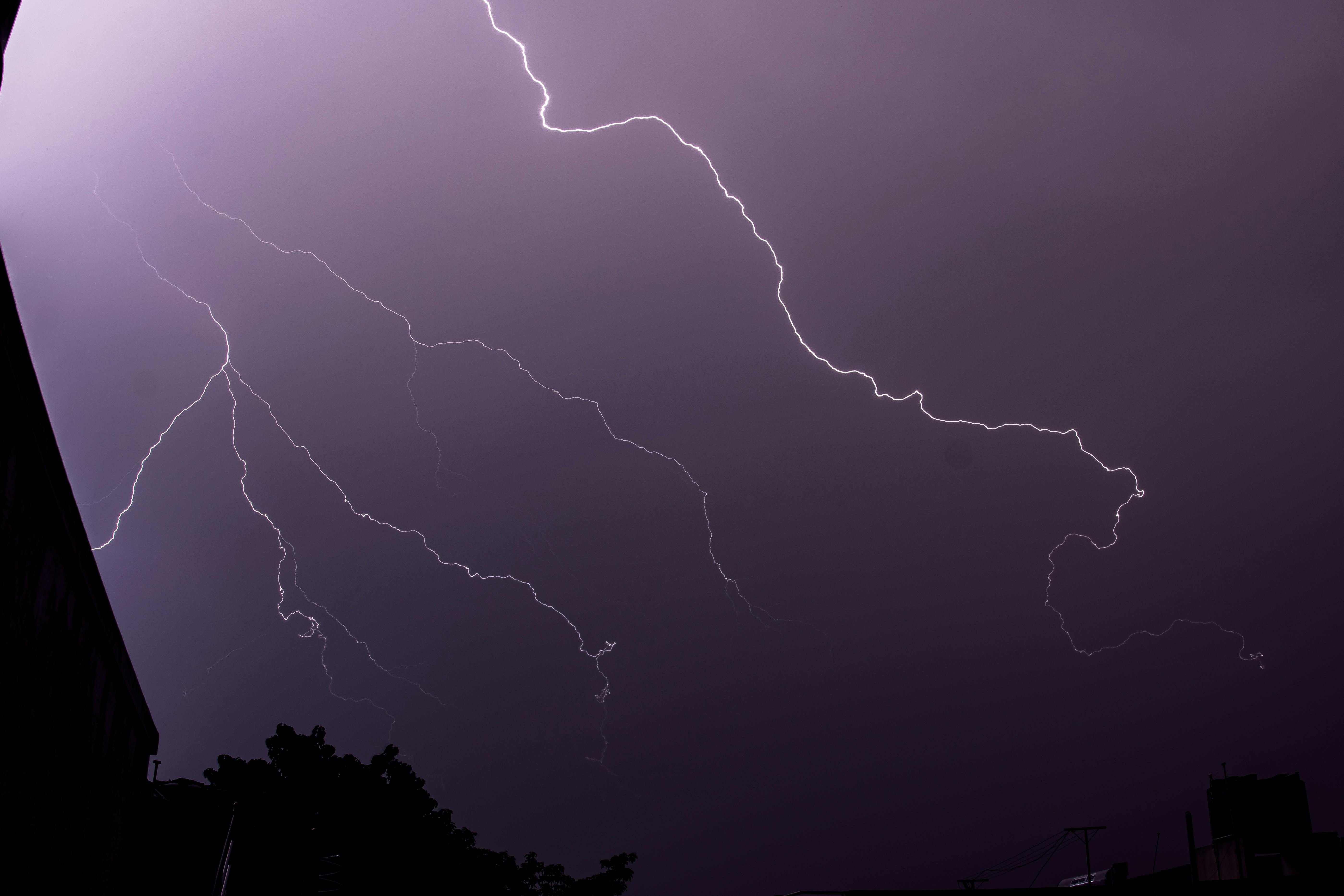 photo of lightning at night