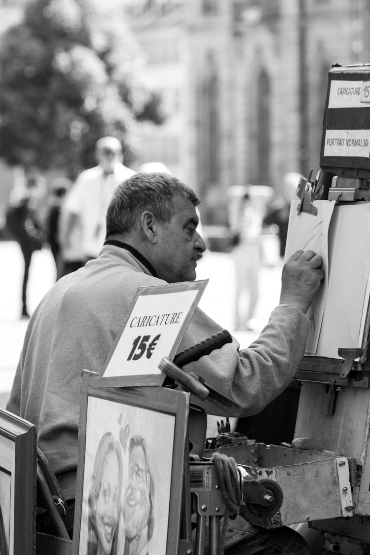 Grayscale Photo Of A Man On The Street