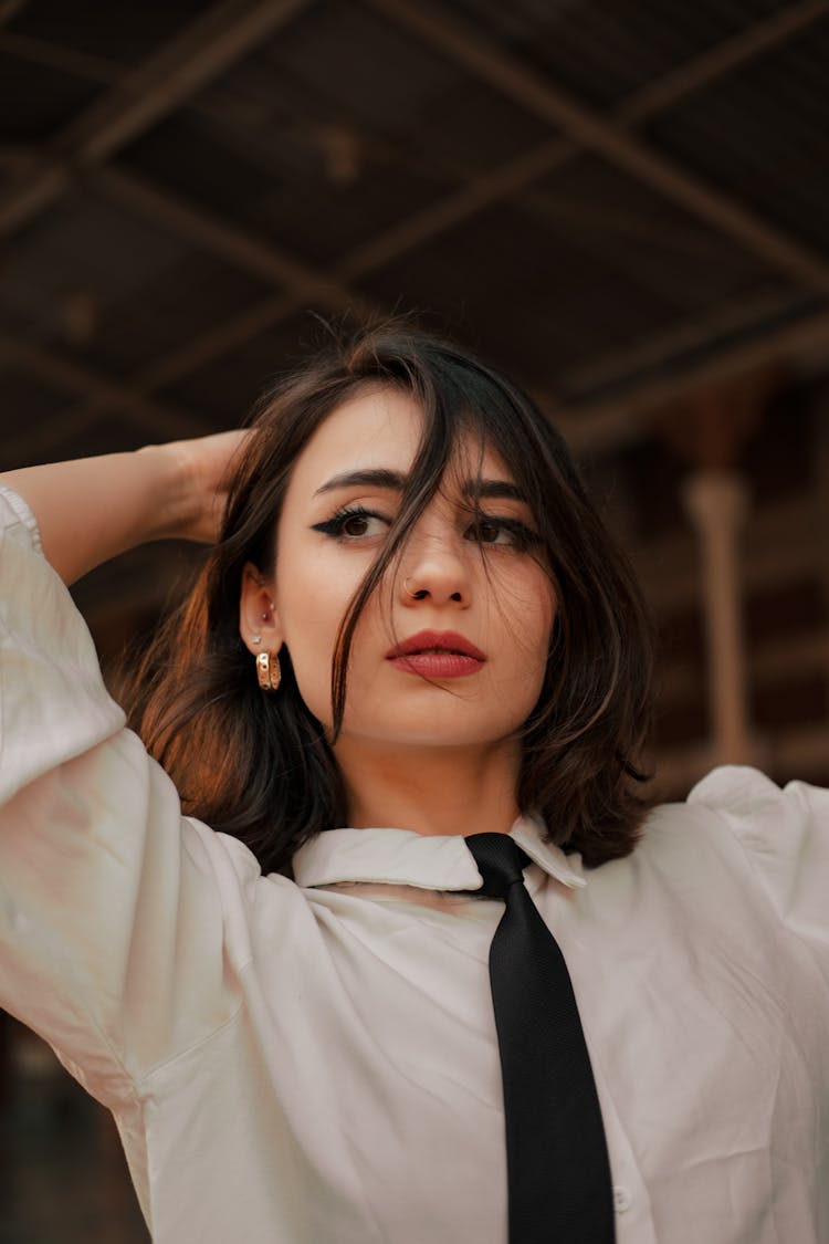 Portrait Of A Woman Wearing A Shirt And A Tie