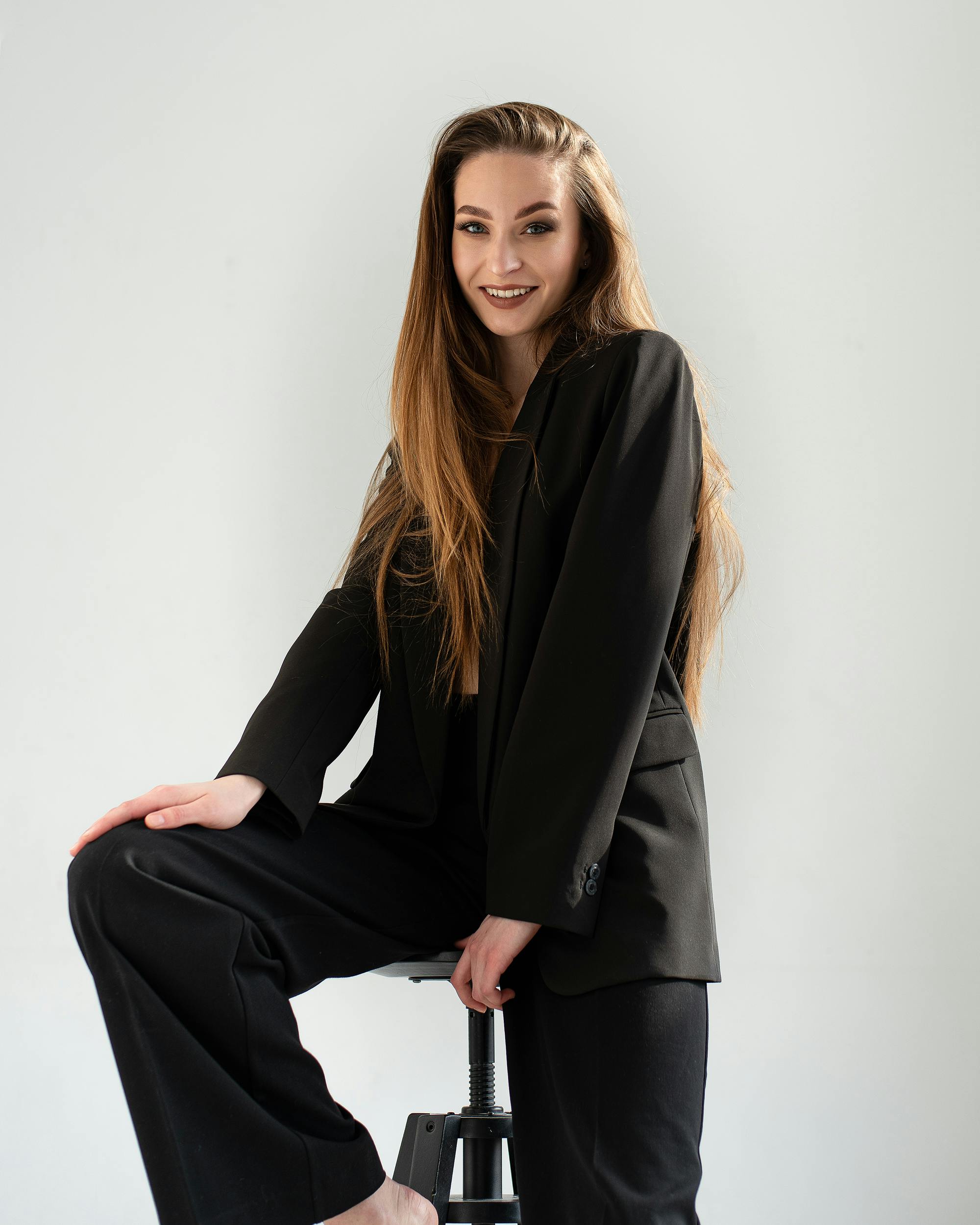 Studio Shoot of a Woman in Black Blazer and Black Pants · Free Stock Photo