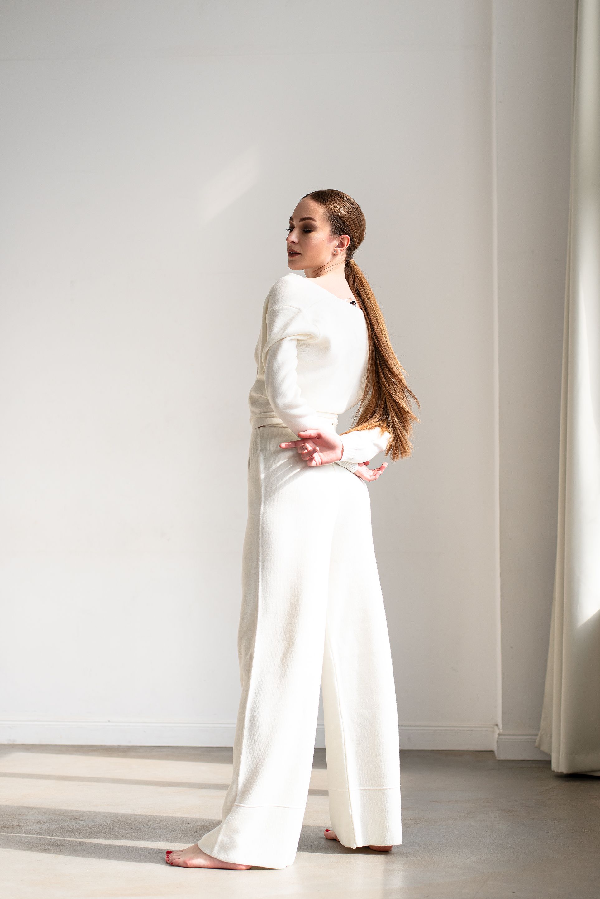Woman in White Top and White Pants · Free Stock Photo — free download