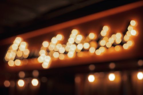 Free A warm and inviting blurred bokeh lights background with a gradient effect, perfect for festive and cozy themes. Stock Photo