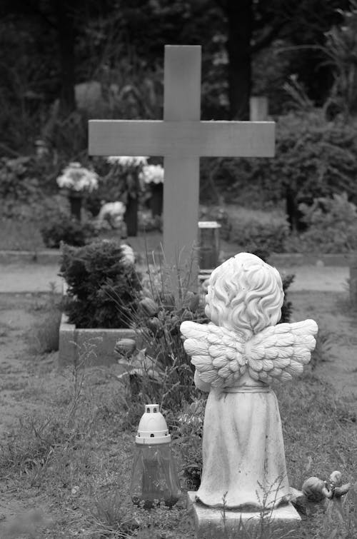 Grayscale Photo of Angel in the Cemetery
