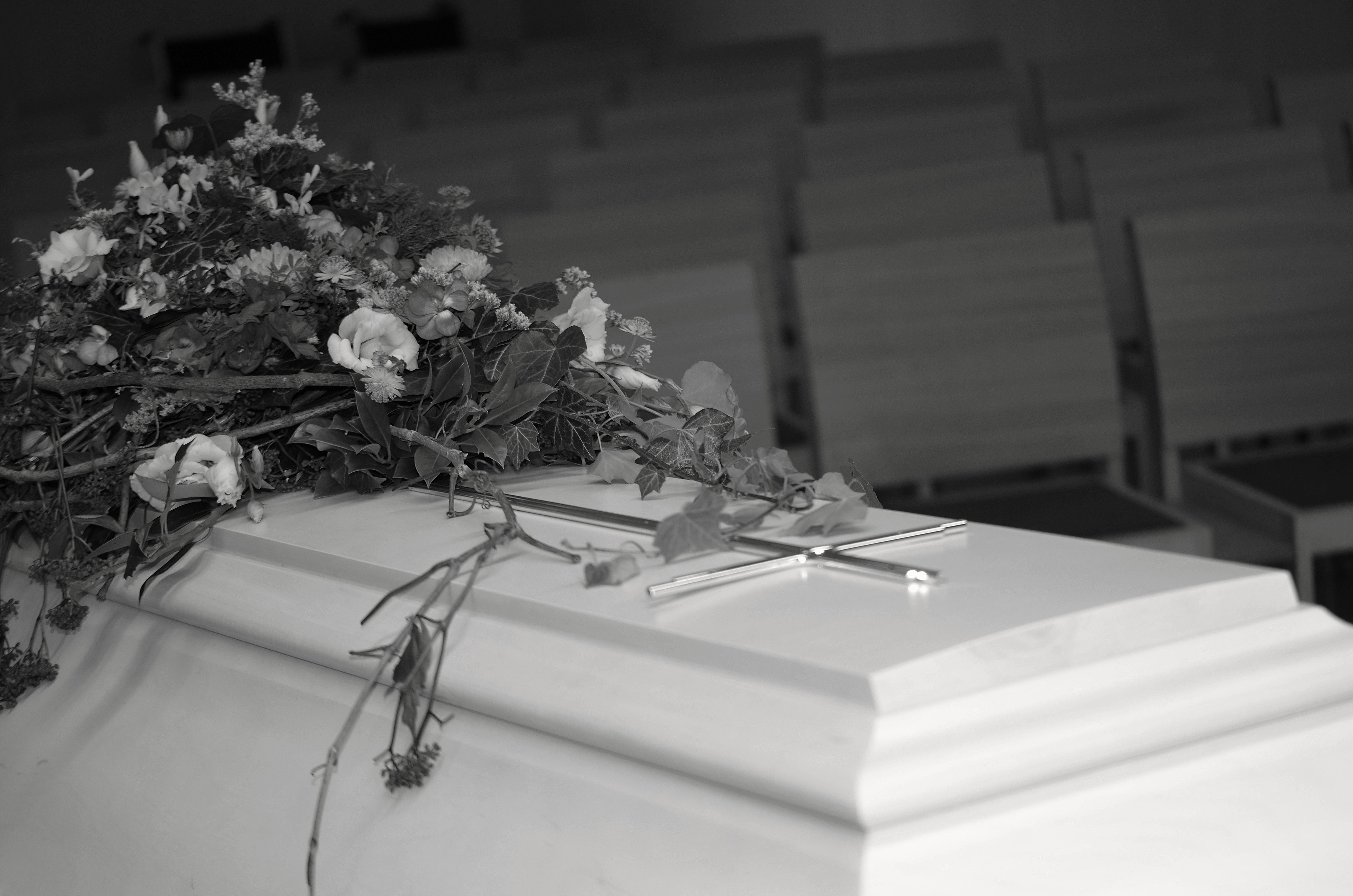 Grayscale Photo of a Coffin