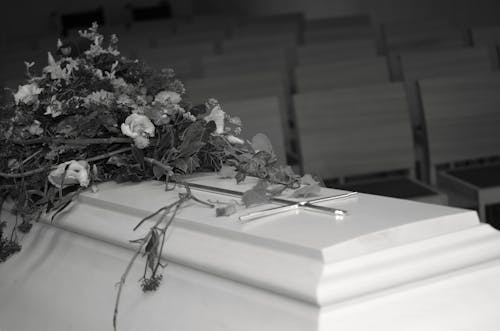 Grayscale Photo of a Coffin