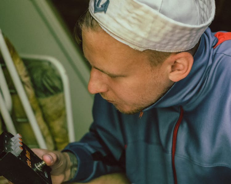 Close-up Of A Man Keeping Electronic Device