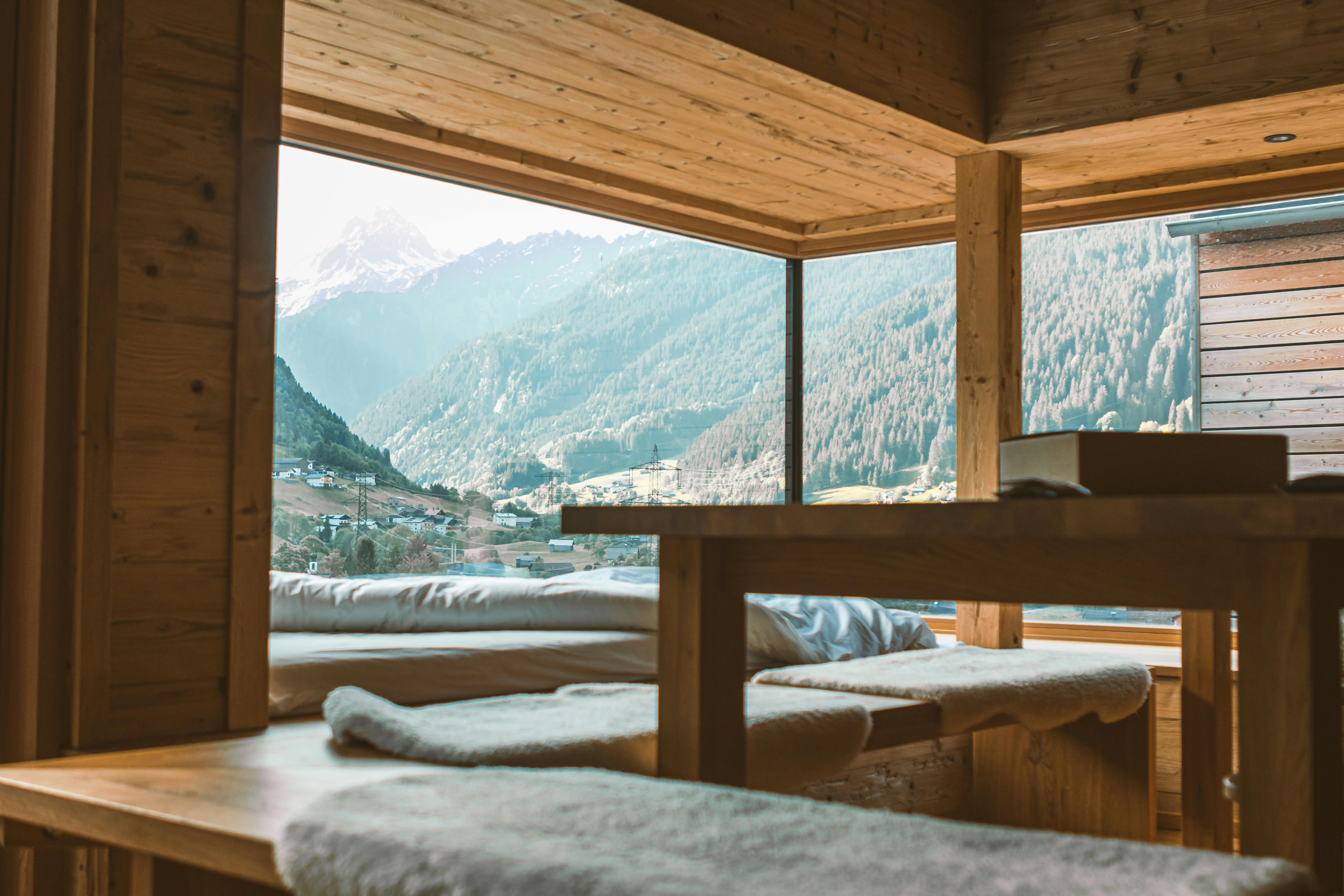 a cozy living room with a view of the snowy Three Sisters mountains in Bend, OR - furnace tune-up company in bend, or