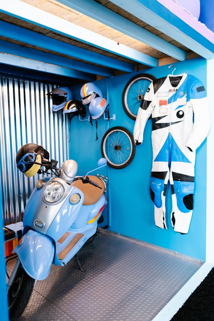 Scooter And Motorcycle Suit In Garage