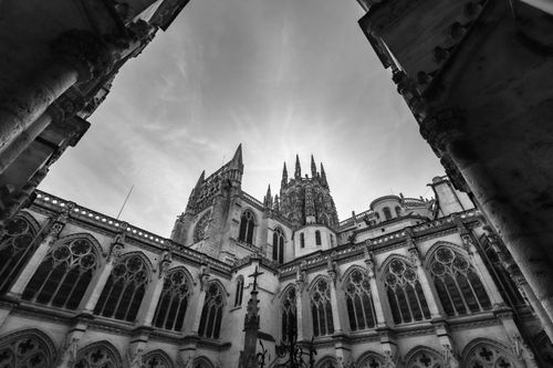 Free Dramatic black-and-white view of the Gothic Burgos Cathedral in Spain, showcasing its intricate architecture. Stock Photo