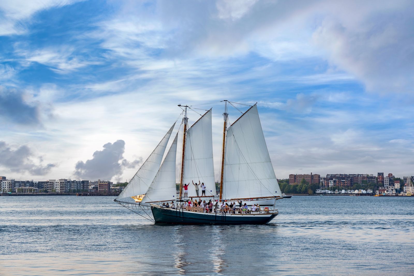 Boston Harbor under sail. The two-hour schooner trip is the cheapest way onto the water and the best view of the skyline.