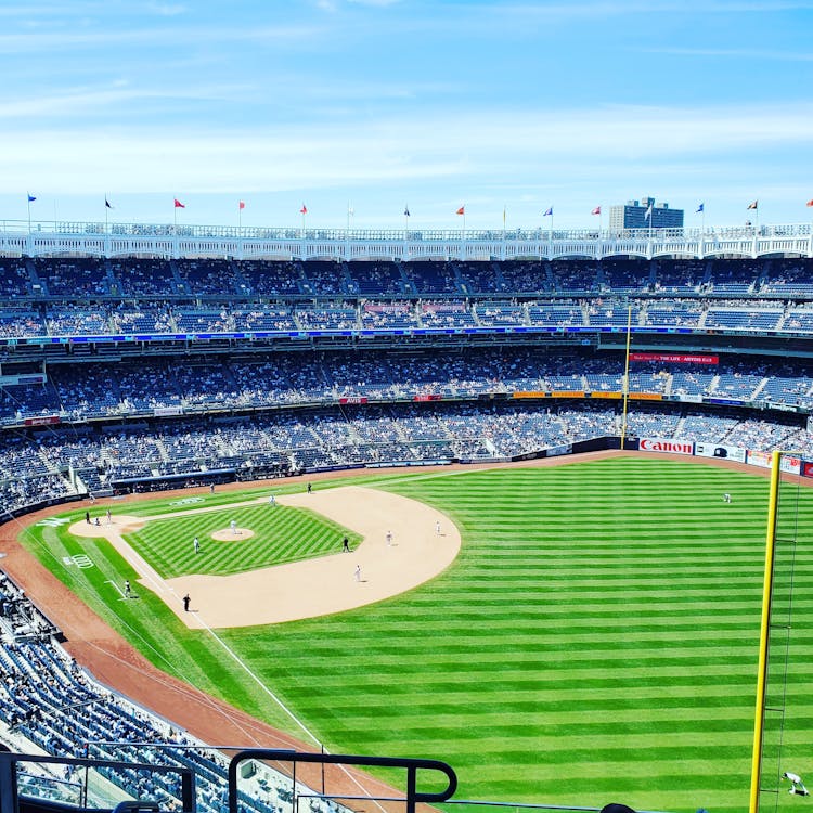 Drone Shot Of People Watching A Baseball Game