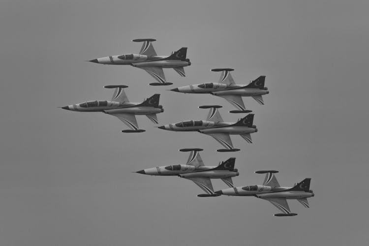 Black And White Photo Of Six Fighter Jets