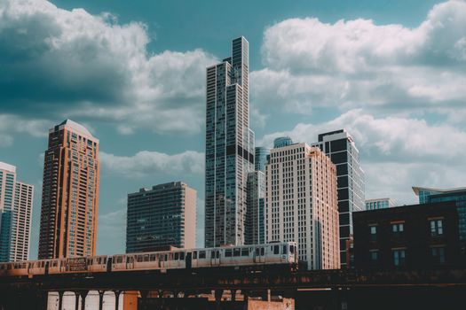 Metro Train Going through City Downtown