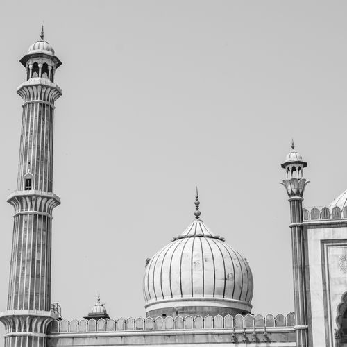 Free Striking monochrome image of Jama Masjid's dome and minarets in Delhi, India. Stock Photo